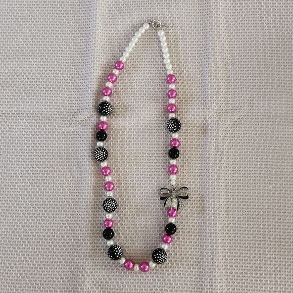 Hot pink and black beaded necklace with rhinestone bow - Picture 3 of 5